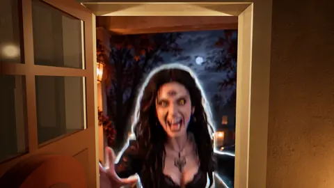 The same woman lunges at the camera with glowing eyes and bared teeth