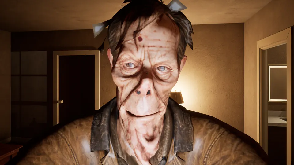 A grinning, scarred old man right in front of the camera inside the house